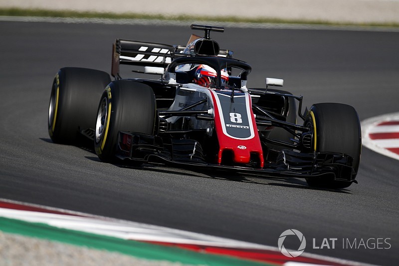 Grosjean quickest as Barcelona test kicks off