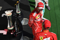 Подіум: переможець Себастьян Феттель, Кімі Райкконен, Ferrari
