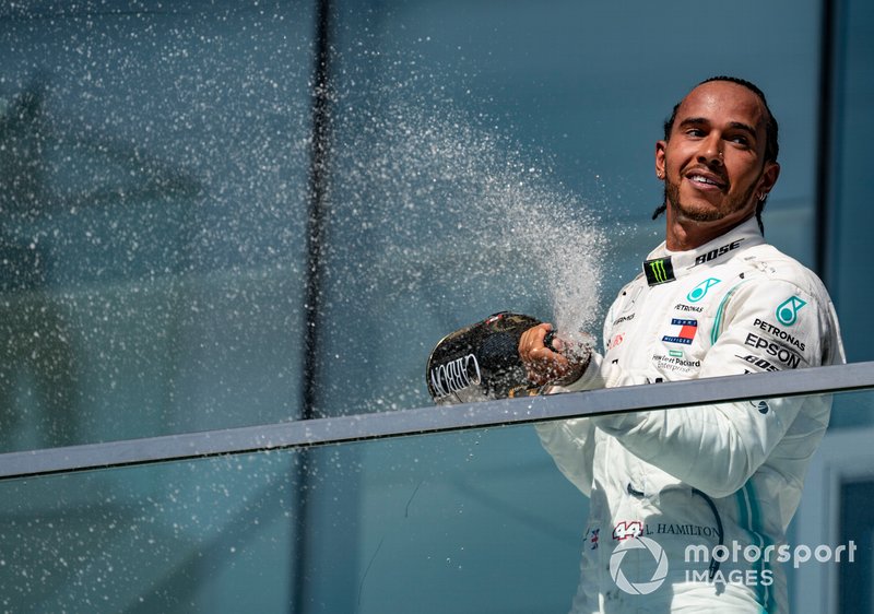 Lewis Hamilton, Mercedes AMG F1, 1st position, sprays Champagne on the podium
