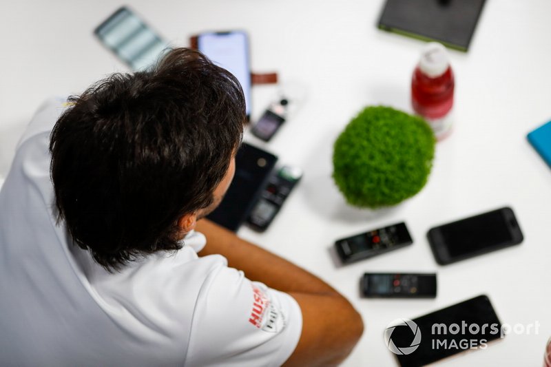 Carlos Sainz Jr., McLaren, talks to the media