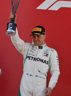 Valtteri Bottas, Mercedes-AMG F1 celebrates on the podium with the trophy