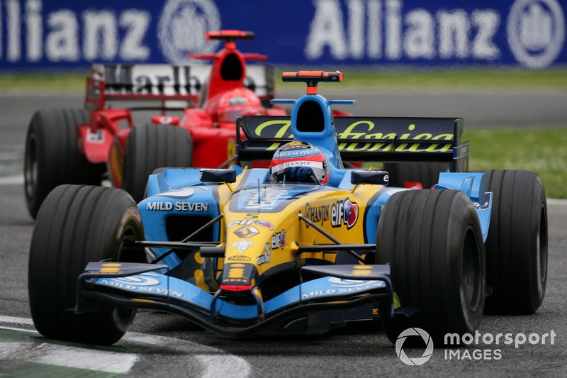 Fernando Alonso, Renault R25, leads Michael Schumacher, Ferrari F2005