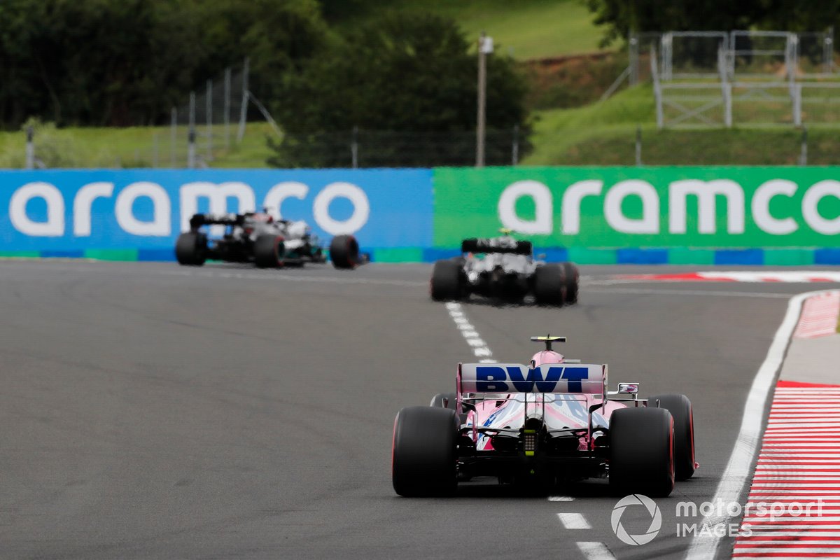 Lewis Hamilton, Mercedes F1 W11, leads Valtteri Bottas, Mercedes F1 W11, and Lance Stroll, Racing Point RP20