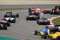 Sebastian Vettel, Ferrari SF16-H and Kimi Raikkonen, Ferrari SF16-H make contact at the start of the
