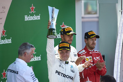 Second place Valtteri Bottas, Mercedes AMG F1, lifts his trophy