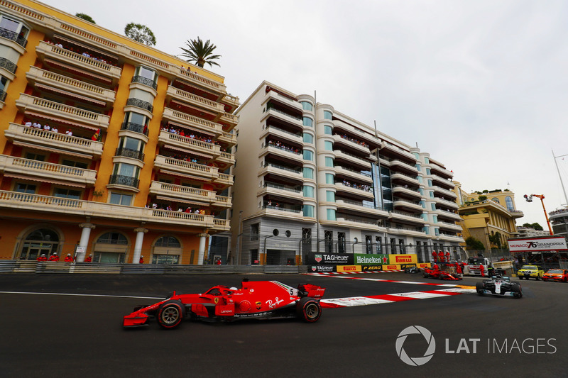 Sebastian Vettel, Ferrari SF71H, leads Lewis Hamilton, Mercedes AMG F1 W09, Kimi Raikkonen, Ferrari SF71H and Valtteri Bottas, Mercedes AMG F1 W09