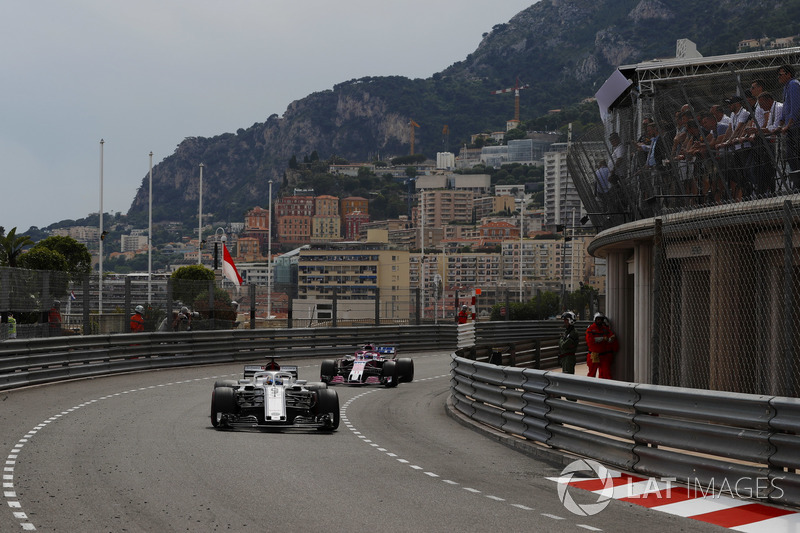 Marcus Ericsson, Sauber C37, leads Sergio Perez, Force India VJM11