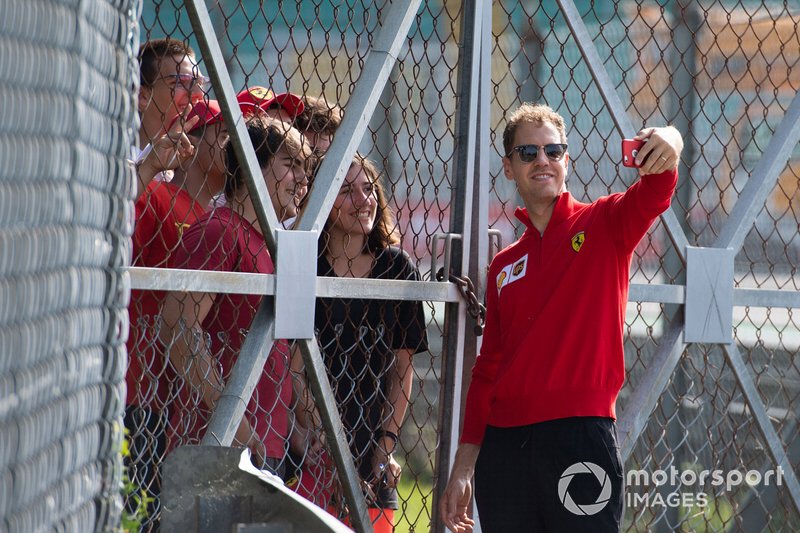 Sebastian Vettel, Ferrari takes a selfie with a fan