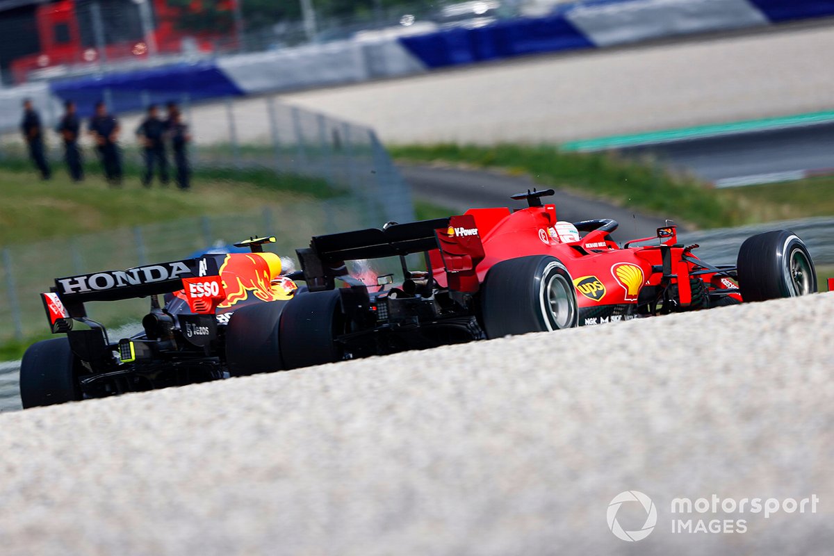 Sergio Perez, Red Bull Racing RB16B , battles with Charles Leclerc, Ferrari SF21