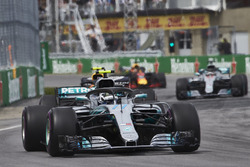 Valtteri Bottas, Mercedes AMG F1 W09, leads Max Verstappen, Red Bull Racing RB14