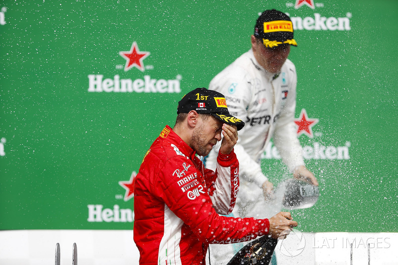 Sebastian Vettel, Ferrari, celebra su victoria en el podio de Canadá