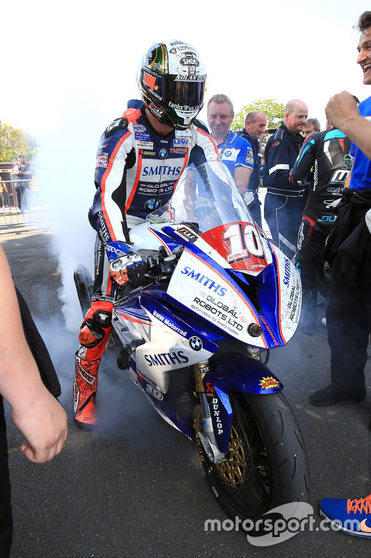 Peter Hickman celebrates winning the RL360º Superstock TT race