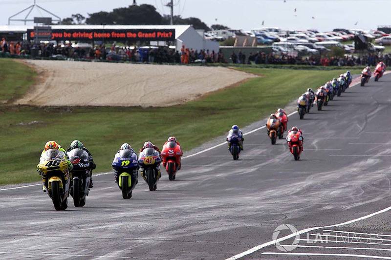 <img src="http://cdn-1.motorsport.com/static/custom/car-thumbs/MOTOGP_2017/RIDERS_NUMBERS/Rossi.png" width="55" /> #11 GP d'Australia 2001