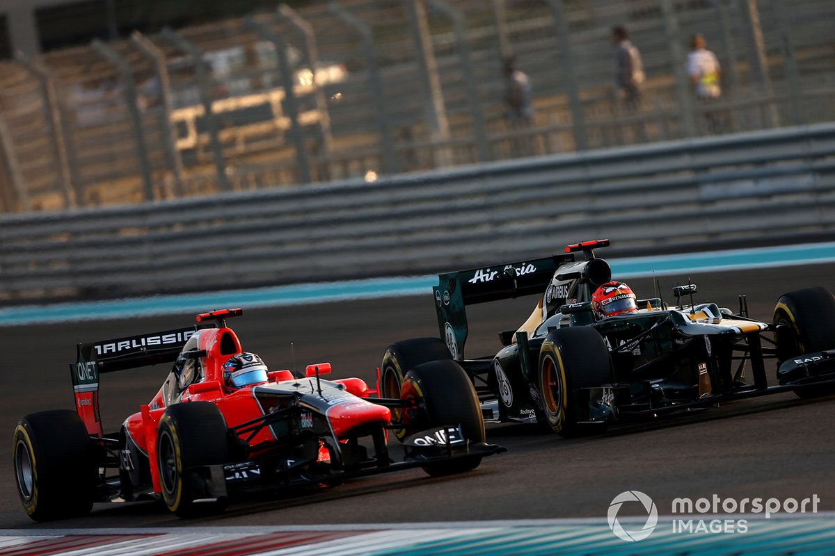 Timo Glock, Marussia MR01 Cosworth, bataille avec Heikki Kovalainen, Caterham CT01 Renault