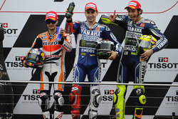 Podium: second place Dani Pedrosa, Repsol Hona; Race winner Jorge Lorenzo, Yamaha; third place Valentino Rossi, Yamaha