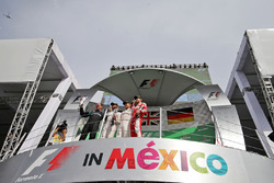 The podium (L to R): Lewis Hamilton, Mercedes AMG F1; Nico Rosberg, Mercedes AMG F1; Sebastian Vette