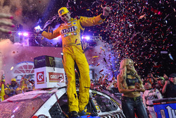 Kyle Busch, Joe Gibbs Racing, Toyota Camry M&M's Red White & Blue, celebrates in victory lane after winning in Charlotte