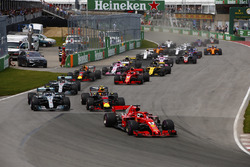 Sebastian Vettel, Ferrari SF71H leads Max Verstappen, Red Bull Racing RB14, Max Verstappen, Red Bull