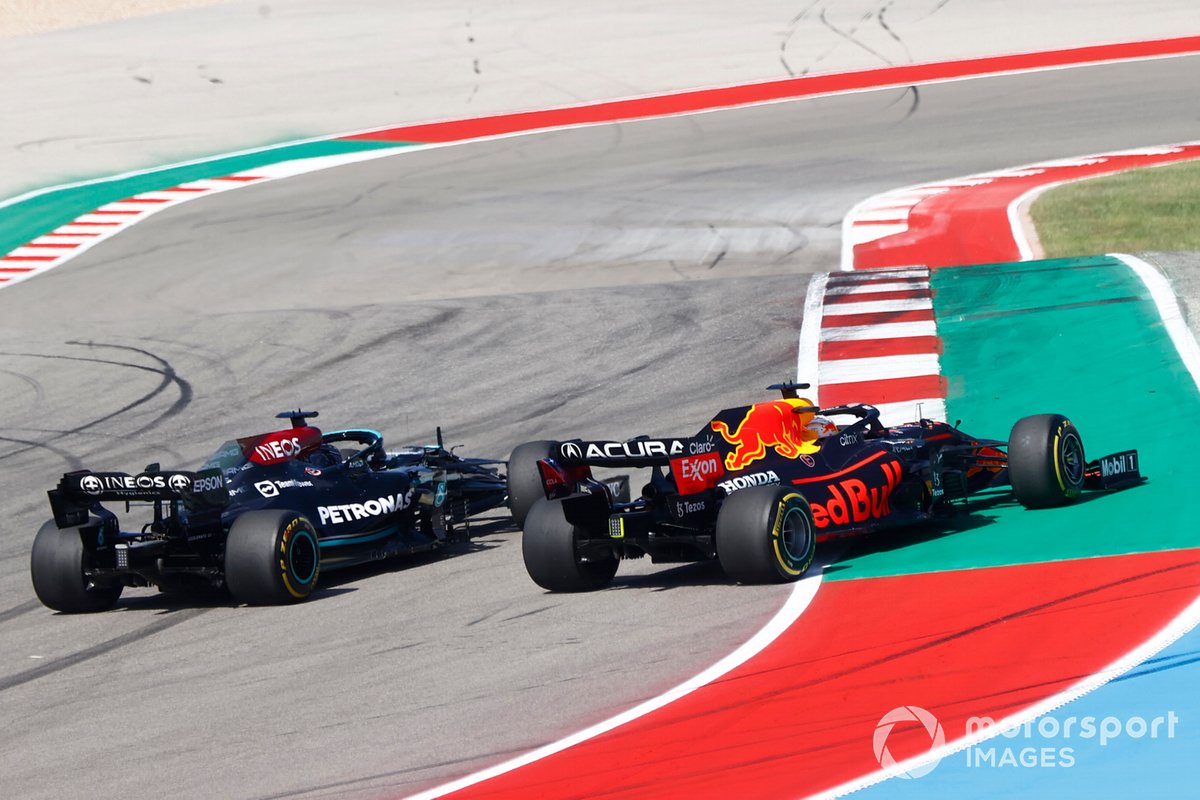 Max Verstappen, Red Bull Racing RB16B, battles with Lewis Hamilton, Mercedes W12