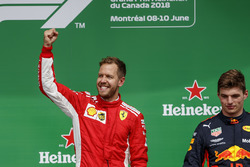 Sebastian Vettel, Ferrari, 1st position, celebrates alongside Max Verstappen, Red Bull Racing, 3rd p