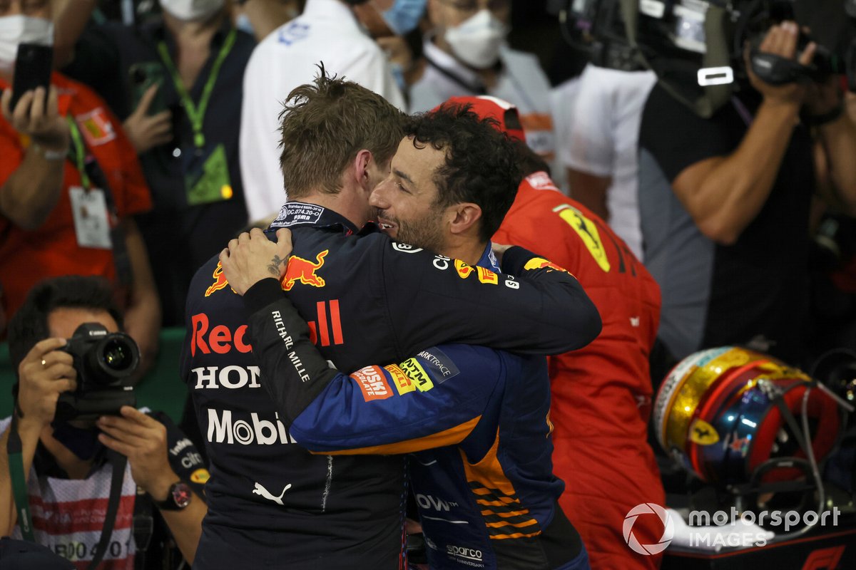 Daniel Ricciardo, McLaren, congratulates Max Verstappen, Red Bull Racing, 1st position, in Parc Ferme