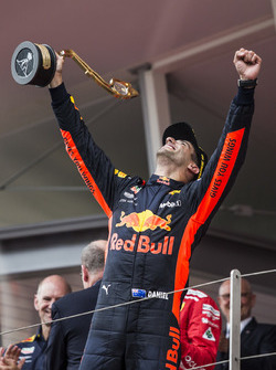 Race winner Daniel Ricciardo, Red Bull Racing celebrates on the podium with the trophy