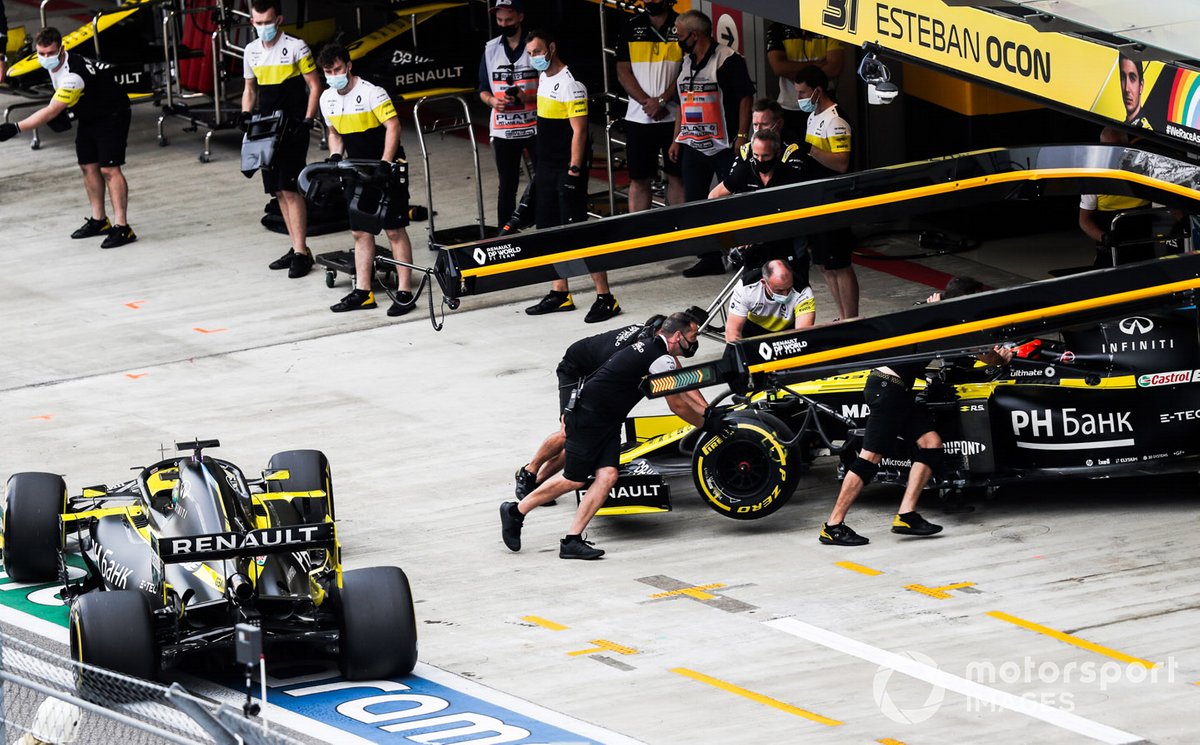 Esteban Ocon, Renault F1 Team R.S.20, is returned to the garage as Daniel Ricciardo, Renault F1 Team R.S.20, arrives outside