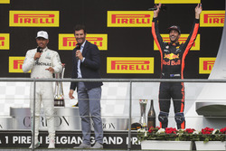 Podium: Mark Webber, Channel 4 F1, interviews race winner Lewis Hamilton, Mercedes AMG F1, third place Daniel Ricciardo, Red Bull Racing, celebrates in the background