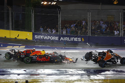 Kimi Raikkonen, Ferrari SF70H, takes out Max Verstappen, Red Bull Racing RB13 and Fernando Alonso, McLaren MCL32
