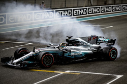 Second place Lewis Hamilton, Mercedes AMG F1, celebrate with doughnuts