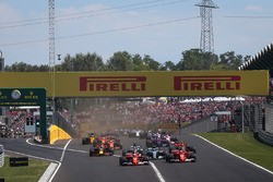 Sebastian Vettel, Ferrari SF70-H leads at the start of the race