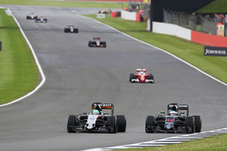 Nico Hülkenberg, Sahara Force India F1 VJM09; Fernando Alonso McLaren MP4-31
