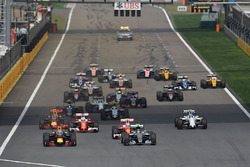 Daniel Ricciardo, Red Bull Racing RB12 and Nico Rosberg, Mercedes AMG F1 Team W07 lead at the start