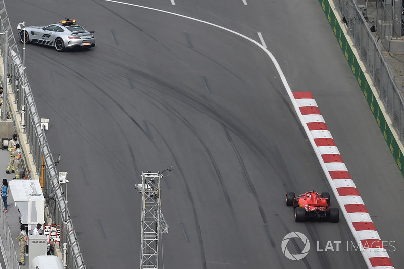 Safety car leads Sebastian Vettel, Ferrari SF71H