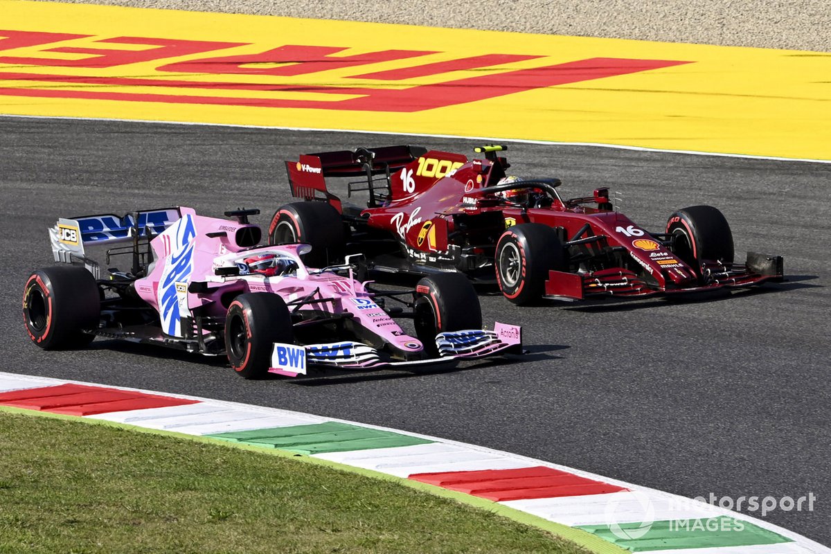 Sergio Perez, Racing Point RP20, battles with Charles Leclerc, Ferrari SF1000
