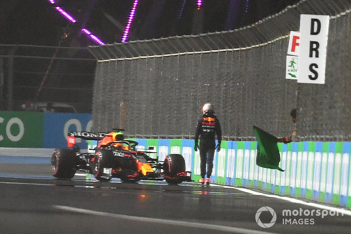 Max Verstappen, Red Bull Racing RB16B, climbs out of his car after crashing out on the final lap of Q3