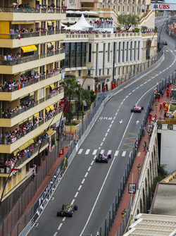 Sergio Perez, Force India VJM11, leads Pierre Gasly, Toro Rosso STR13, and Nico Hulkenberg, Renault Sport F1 Team R.S. 18