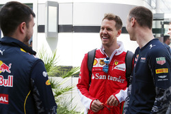 Sebastian Vettel, Ferrari with members of Red Bull Racing