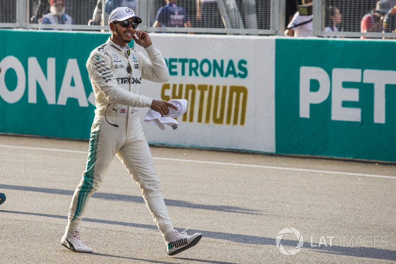 Pole sitter Lewis Hamilton, Mercedes AMG F1 celebrates in parc ferme