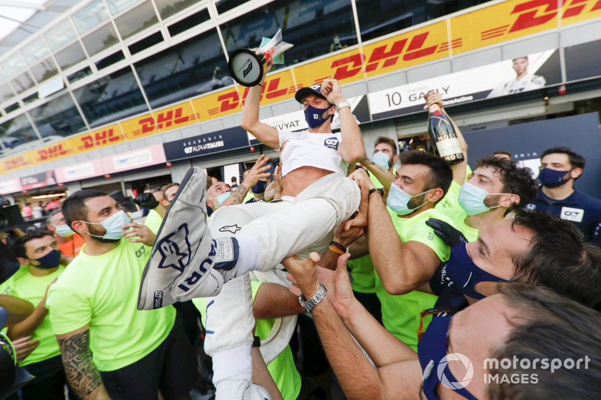 The AlphaTauri team lift Pierre Gasly, AlphaTauri, 1st position, onto their shoulders after the race