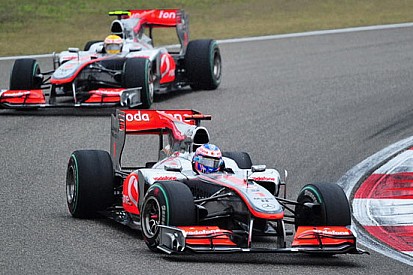 Cina: gara bagnata, Button vince e convince