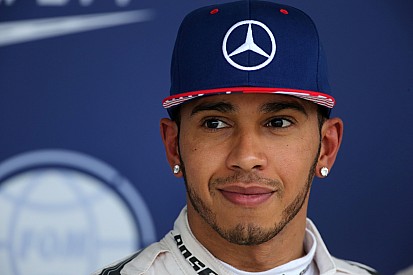 Hamilton remporte le GP de l'année et devient Triple Champion!