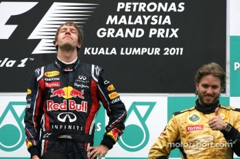 Podium: race winner Sebastian Vettel, Red Bull Racing, third place Nick Heidfeld, Lotus Renault F1 Team