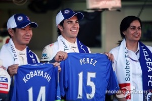 Kamui Kobayashi with team mate Sergio Perez and Monisha Kaltenborn, Sauber F1 Team Managing Director