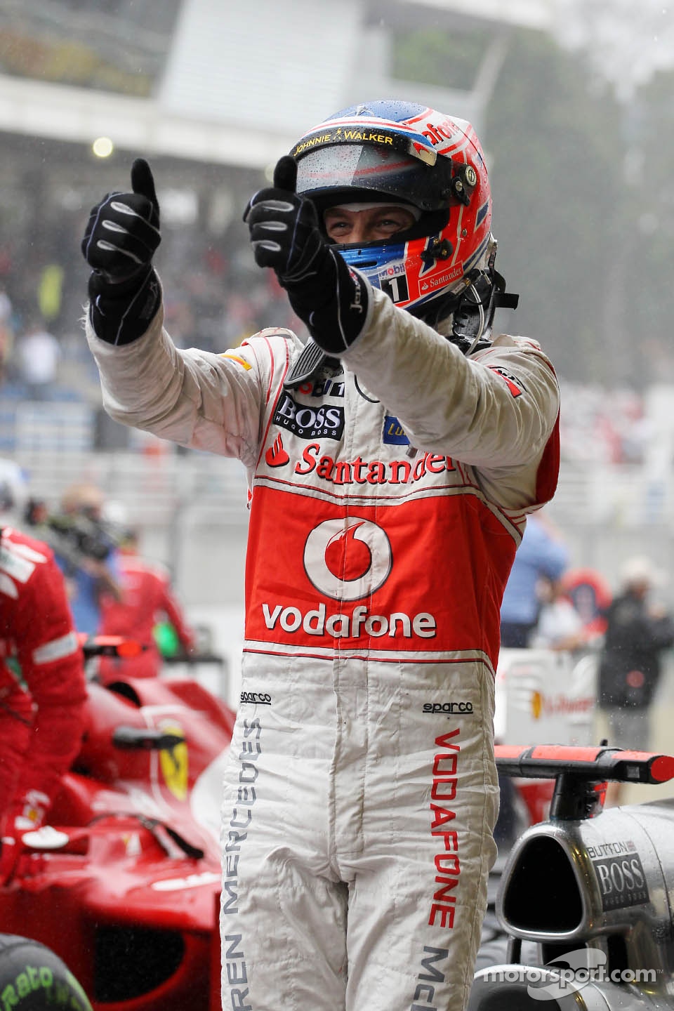 Race winner Jenson Button, McLaren celebrates in parc ferme