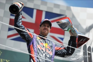 Race winner Sebastian Vettel, Red Bull Racing celebrates on the podium