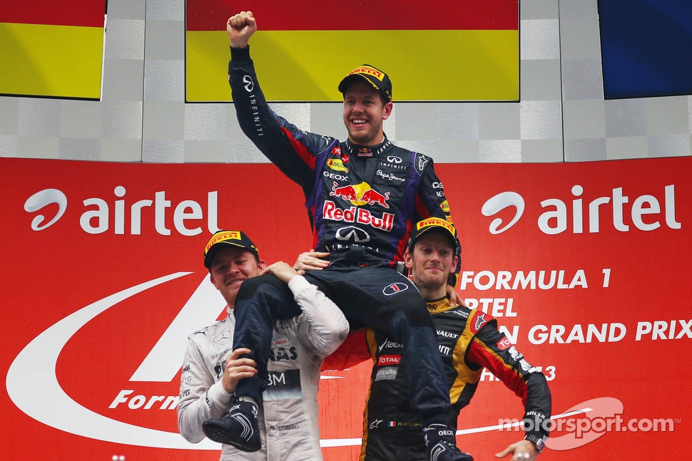 Podium: race winner and 2013 world champion Sebastian Vettel, second place Nico Rosberg, third place Romain Grosjean