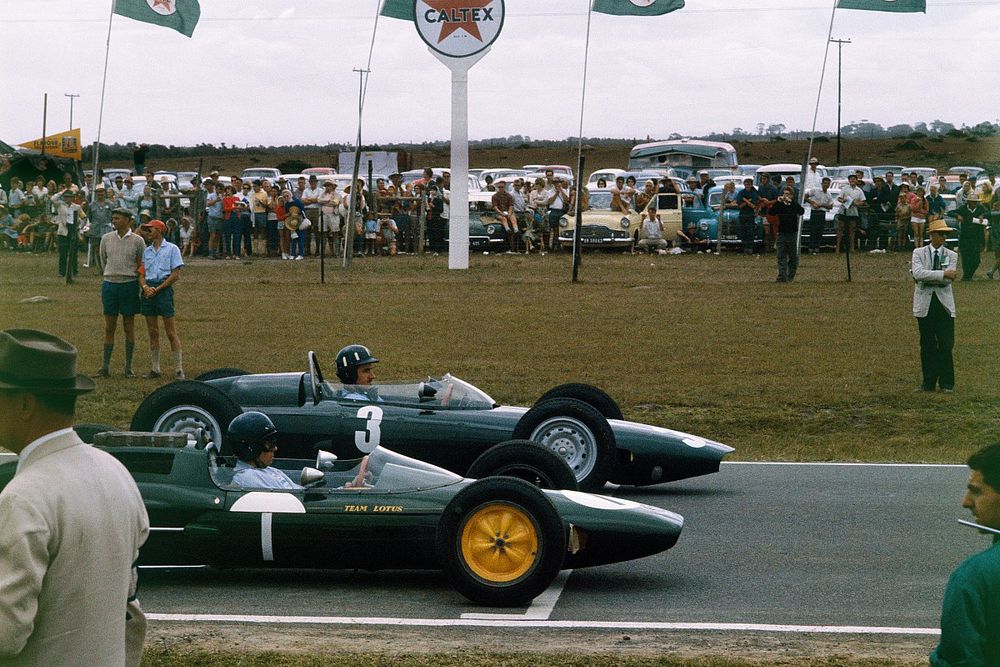 Graham Hill, BRM P57 and Jim Clark, Lotus 25 Climax