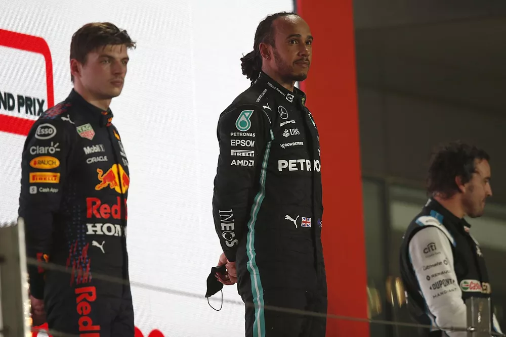 Max Verstappen, Red Bull Racing, 2nd position, and Lewis Hamilton, Mercedes, 1st position, on the podium