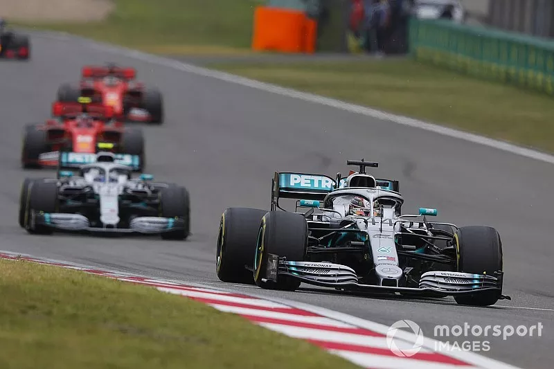 Lewis Hamilton, Mercedes AMG F1 W10, leads Valtteri Bottas, Mercedes AMG W10, and Charles Leclerc, Ferrari SF90
